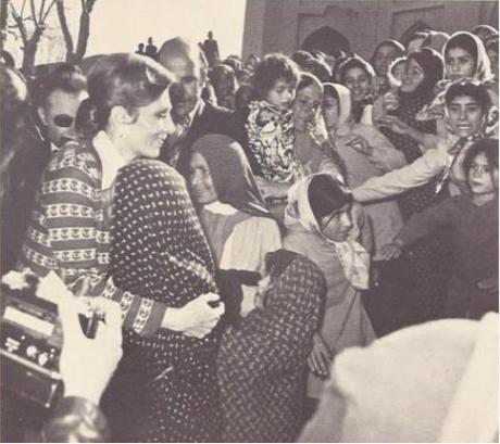 ROYALTY AND THE PEOPLE: Farah visits village wives and children (1970's)