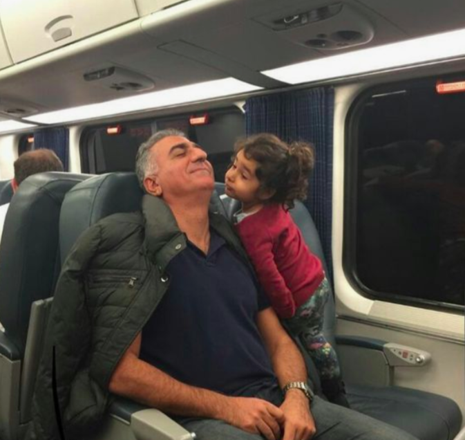 Reza Pahlavi with his niece Aryana Pahlavi in a train on the way to New York