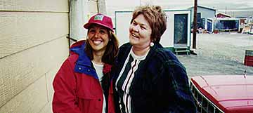 Christine Dennison (left), with a local resident in the Arctic, March 1996.