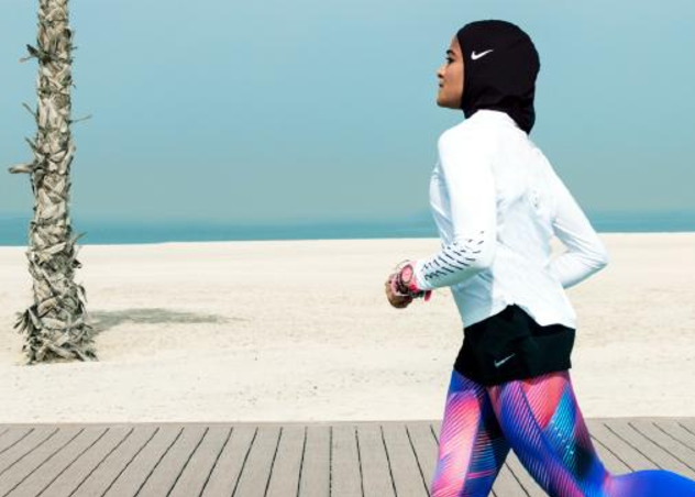 Manual Rostom jogs wearing Nike's new hijab for Muslim female athletes