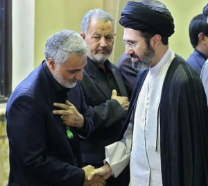 Mojtaba Khamenei (R) with Iranian commander Qassim Soleimani.
