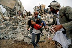 A man carries Buthaina Muhammad Mansour, believed to be four or five, rescued from the site of a Saudi-led air strike that killed eight of her family members in Sanaa, Yemen August 25, 2017. REUTERS/Khaled Abdullah/File Photo